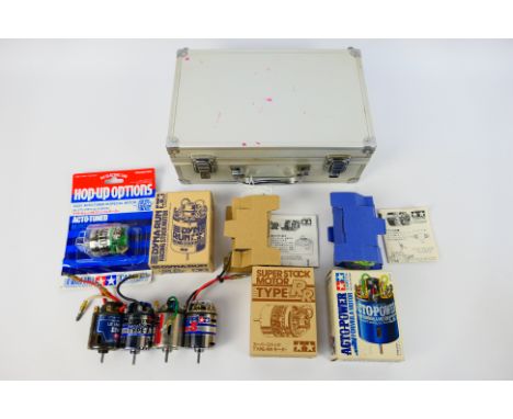 Tamiya - Kyosho - Yokomo - A group of eight RC model car motors. Lot includes of a boxed Tamiya #53154 Acto Power Formula Mot