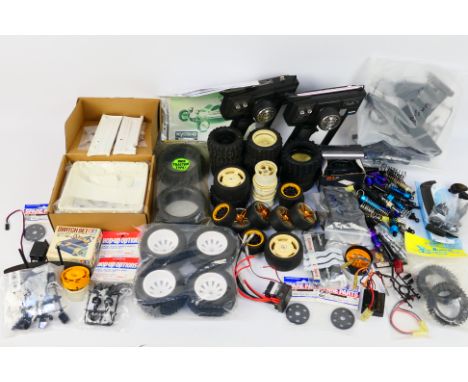 Tamiya - Kyosho - Other - A mixed group of RC spare parts and accessories, some of which are still sealed within packaging. L
