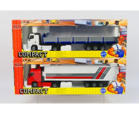 Joal - Two boxed diecast 1:50 scale trucks. Lot consists of Joal #337 Volvo FH12-420 with trailer; together with #330 Volvo F