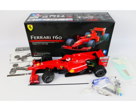 Tamiya - A boxed and constructed 2009 Tamiya #58447 1:10 scale electric 'Ferrari F60' RC car. The kit has been built to a Ver