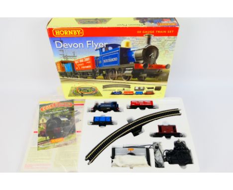 Hornby - A boxed Hornby R1121 OO gauge 'The Devon Flyer' train set. Set contains Blue Diamond 0-4-0T locomotive, with two wag