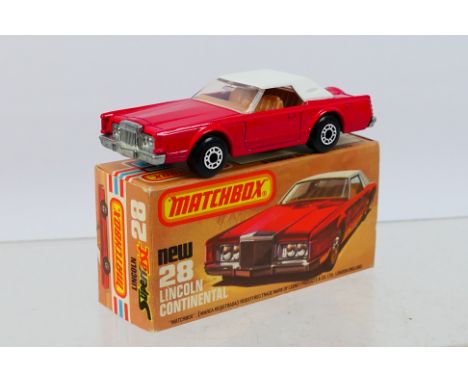 Matchbox - Superfast - A boxed Lincoln Continental with light brown interior # 28 which appears Mint in a Very Good box. (Thi