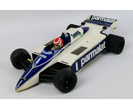 Tamiya - A vintage 1982 unboxed and constructed Tamiya #58169 1:10 scale Brabham BMW BT50 Turbo. The car is basically a body 