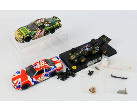 Scalextric - MG Vanquish - A boxed MG Vanquish #40059 F1 John Player Special Lotus 72D 1:32 slot car 'Emerson Fittipaldi Worl