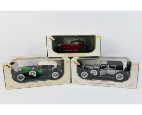 Signature Models - Three boxed diecast 1:18 scale model cars from Signature Models. Lot comprises of #18110 1934 Duesenberg; 