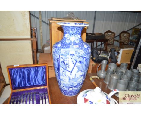 A blue and white oriental pattern stick stand AF