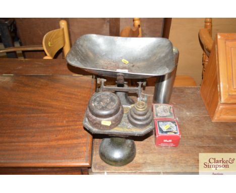 A set of kitchen scales and weights; boxed glassware; a flask