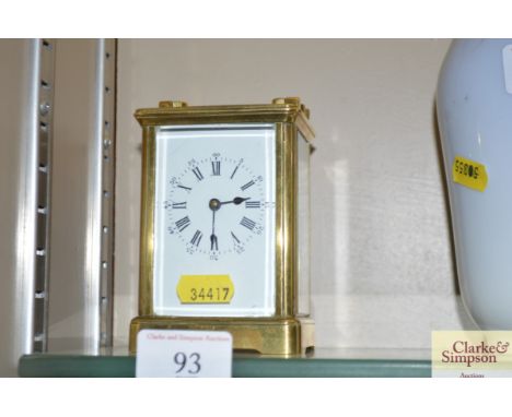 An early 20th Century brass cased carriage clock with key