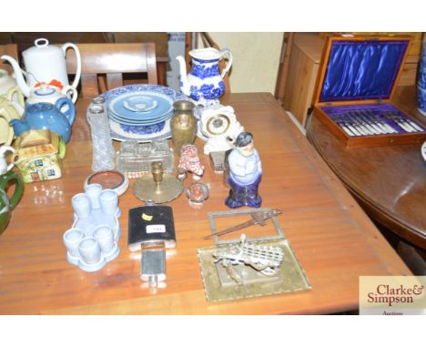 A quantity of blue and white china; Wedgwood Jasper ware plates; a hip flask; a mantel clock; a desk stand; silver collared v