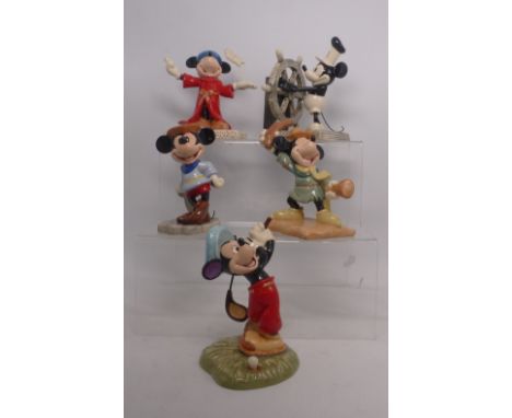 A group of five Disney Showcase figures, all boxed to include: Steamboat Willie, Brave Little Tailor, Sorcerer's Apprentice, 
