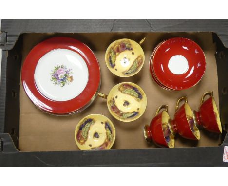 Aynsley, Six red and gilt orchard gold teacups and saucers. Together with a likely married set of six reg ground and floral s