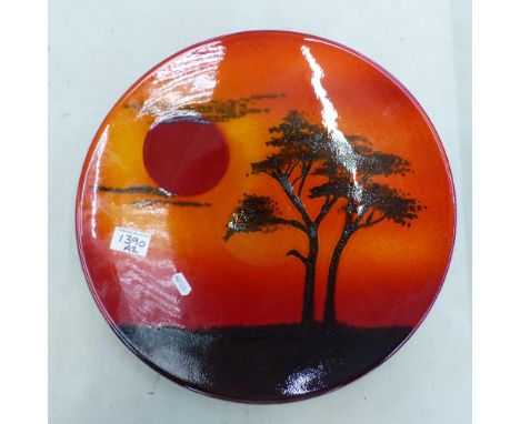 Large Poole charger in circular form, sunset scene, diameter 40cm.