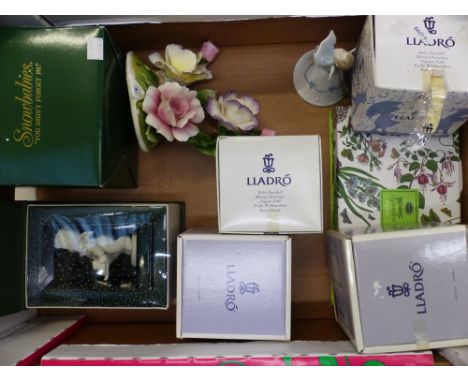 Mixed collection of items to include 4 boxed Lladro bells, Capodimonte floral study, 2 boxed Snow Babies and a boxed Portmeir