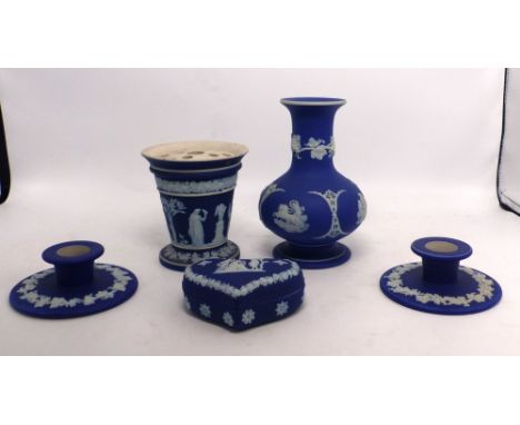 Collection of Wedgwood cobalt blue jasperware to include footed vase, vase with flower frog, heart shaped lidded trinket dish