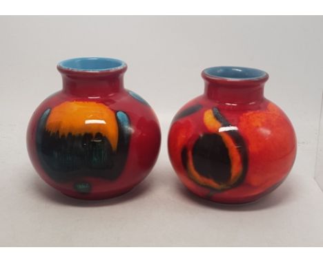 Poole Pottery Volcano pattern vase together with a similar patterned vase height 10cm