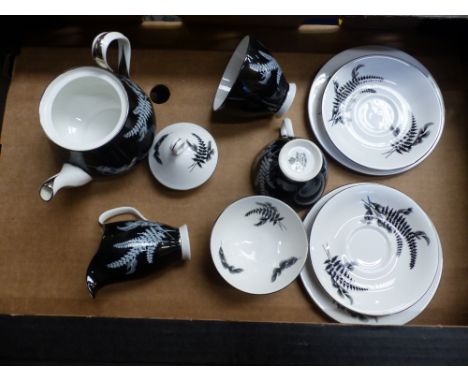 Royal Albert 'Tea for Two' set in the Night and Day pattern: teapot, milk jug, open sugar bowl and two tea trios.