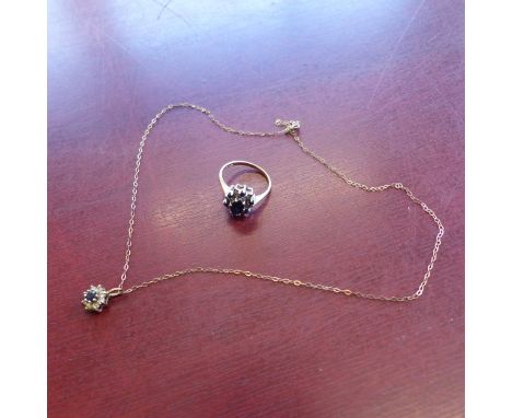 9ct fine gold chain with sapphire and clear stone pendant (chain tangled) together with a 9ct gold dress ring set with sapphi
