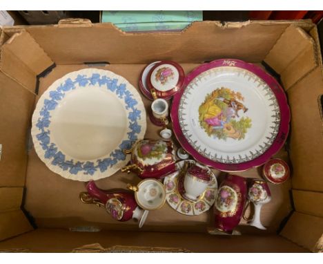 A suite of Limoges ceramic items to include decorative wall plates, lidded pot and vases together with a Wedgwood Queensware 