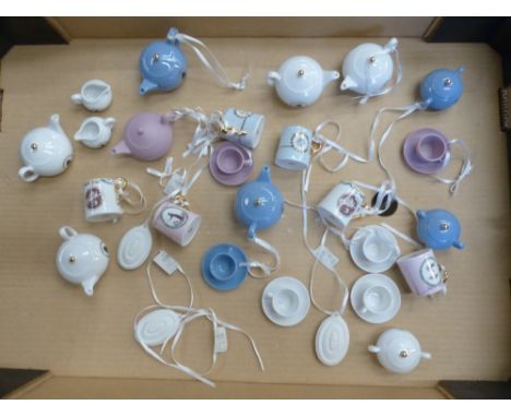 A collection of Wedgwood Christmas tree decorations in the form of teapots, cup and saucers, miniature tankards etc, some pie