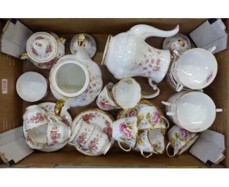 Paragon Elizabeth Rose Patterned part tea set to include teapots, teacups and saucers, lidded sugar bowl, sugar bowl and side
