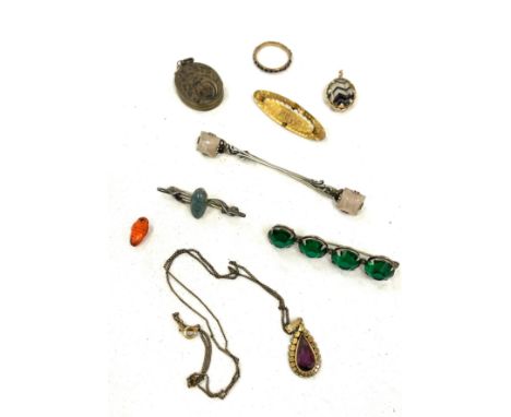 Collection of antique jewellery to include garnet eternity ring , locket, silver cloak pin 