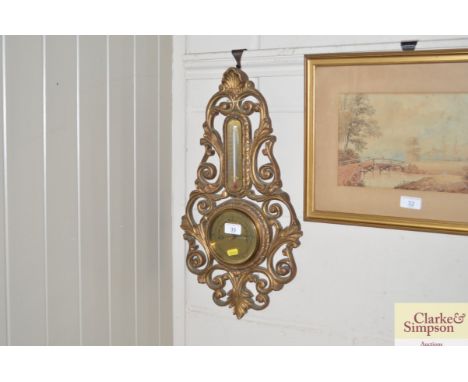 A gilt mounted barometer 