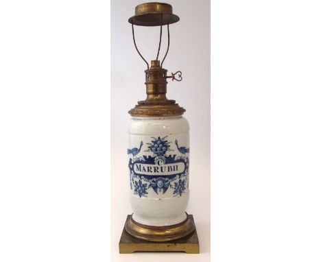 Delft drug jar   made into a lamp base, painted in blue and white and labelled 'C. Marrbii' early 19th century lamp, total he