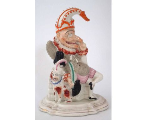 Staffordshire Punch doorstop flat back figure, modelled with dog at his side, mid 19th century, 28cm high     Condition repor