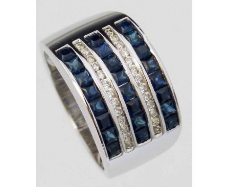 18K white gold broad band ring set with five channels of sapphires and diamonds, width 11mm, 7.6g gross.