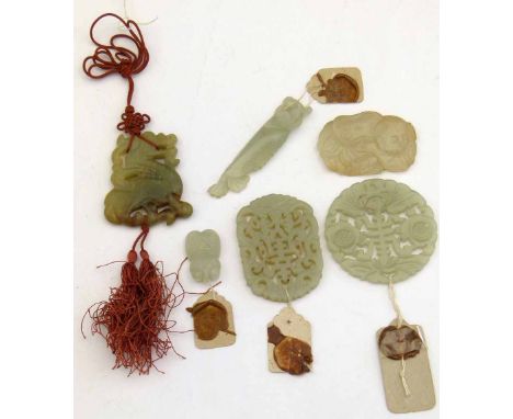Six Chinese jade pendants: circular disc carved with Shou, 5.5cm; a carved elongated cicada, 6.5cm; a small cicada, 2.5cm; dr