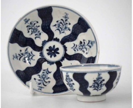 Lowestoft teabowl and saucer circa 1780  painted with Robert Browne pattern of flowers between blue scale bands, crescent mar