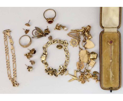 9ct gold charm bracelet, two bracelet chains, two rings, several ear studs and a stick pin.
Condition report: Gross weight 62