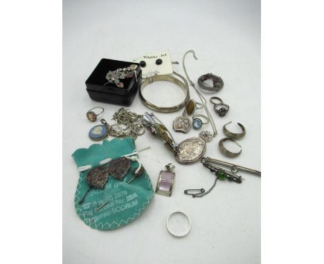 Hallmarked Sterling silver bright cut hinged bangle, a sterling silver bright cut locket, two pairs of silver earrings, a col