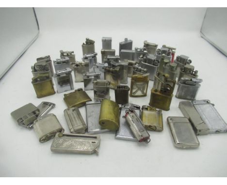 Large collection of early 20th century lighters inc. Parker Beacon, The Roller Beacon, Diamond, Fork, etc 