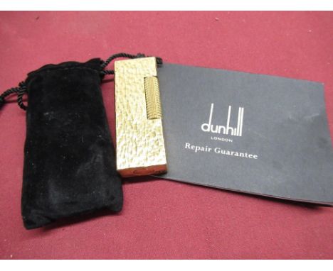 Late 1970s Dunhill Rollagas gold plated butane lighter with bark effect case, with bag and Dunhill Repair guaranteeLighter wo