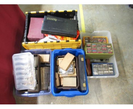Four boxes of lighter parts and cases 