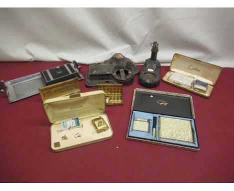 Japanese design ash tray, lighthouse ashtray, 5 lighter and cigarette case sets and a partial lighter cigarette case tray(8) 
