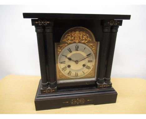 Late C19th continental mantel clock, ebonised style case on rectangular stepped base brake arch dial opening to reveal brass 