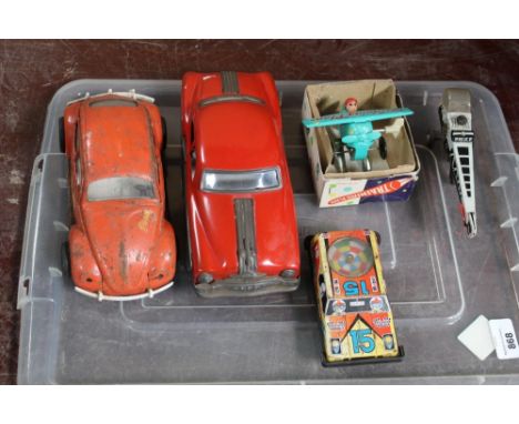Friction tinplate training plane, boxed with instructions, Tonka tinplate VW Beetle, a tinplate friction driven Bluebird salo