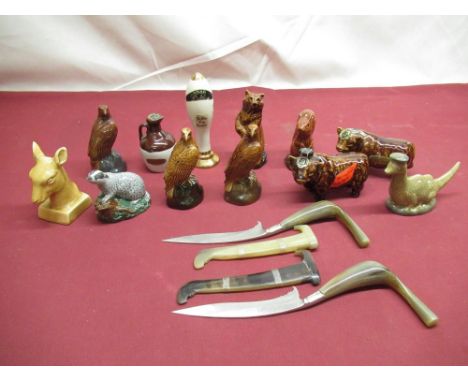 Three Beswick Beneagles scotch whisky, miniature whisky decanters in the form of Golden Eagle, The Loch Ness monster, other n