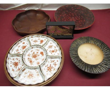 C20th lazy Susan of circular form with seven fitted ceramic dishes makers mark to the base, mahogany fruit bowl with segmente