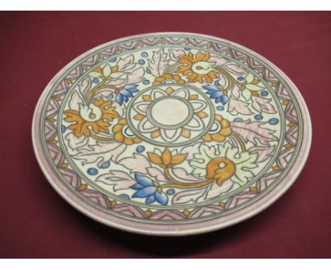 Charlotte Rhead for Crown Ducal, 1930's circular wall plaque, floral decoration, and polichrome enamel stamped on reverse wit