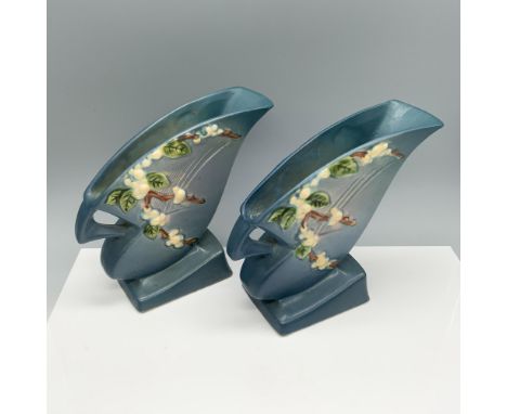 Enchanting pottery duo of flower holders with a branch design. Roseville backstamp. Issued: 1940sDimensions: 8.5"L x 3.5"W x 