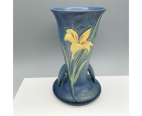 Gorgeous pottery with a sturdy base and handles for displaying flowers. Roseville backstamp. Issued: 1940sDimensions: 6"L x 9