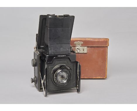 An Ernemann Model I Quarter Plate Folding Reflex Camera, with Ernon 135mm f/3.5 lens, serial no 188028, body G-VG, elements G