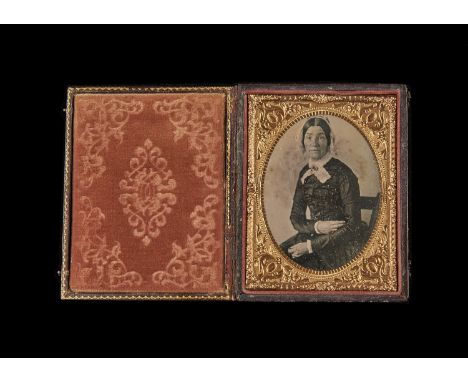 Cased Portrait Daguerreotypes of Ladies,  quarter-plate of lady with lace cap and lappets and gilt-highlighted brooch (1), si
