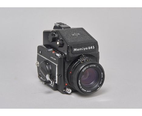 A Mamiya M645-1000S Camera, serial no L170519, shutter working, film back button jammed, unable to open, metered prism viewfi