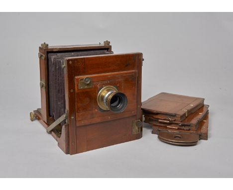 A 19th Century mahogany and brass Half-Plate Tailboard Camera,  later fitted with f/8 brass lens, comb-jointed, back and focu