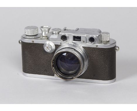 A Leica IIIb Camera, serial no. 284134, 1938, chrome, shutter working, body F-G, engraving worn, with a 5cm f/2 Summitar no. 