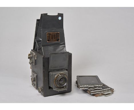 A Graflex Series B Quarter Plate Reflex Camera, with W Watson & Sons 7'' f/1.9 Holostigmat series I lens, serial no 1140, bod